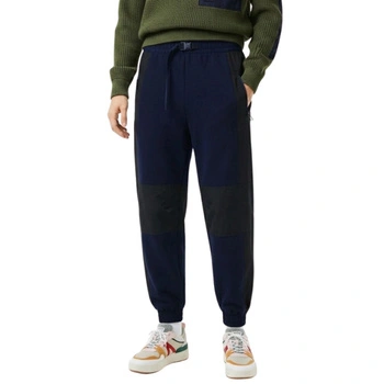 Spodnie damskie Lacoste Badge dresowe sportowe granatowe r. XS