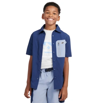 Koszula chłopięca New Balance Premium Shirt granatowa z krótkim rękawem r. 140