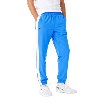 Spodnie męskie Lacoste joggery niebieskie sportowe r. XS