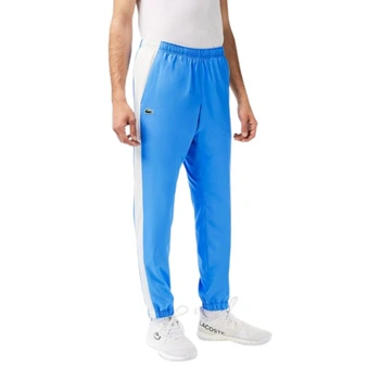 Spodnie męskie Lacoste joggery niebieskie sportowe r. XS