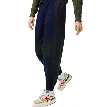 Spodnie damskie Lacoste Badge dresowe sportowe granatowe r. XS